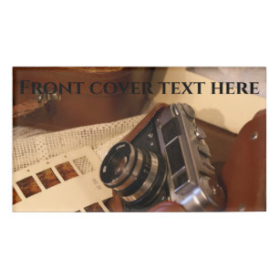 Vintage analogue camera in leather brown case name tag