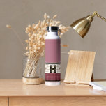 Vintage Bistro Tile Cranberry and Gold Monogram Water Bottle<br><div class="desc">These classy cranberry,  cream and gold faux tile water bottles are perfect gifts. Their clean lines,  simple colours,  and vintage pattern are timeless and versatile. A bistro tile design for sophisticated taste.</div>