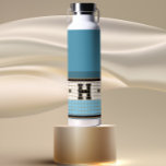 Vintage Bistro Tile Dusty Blue and Gold Monogram Water Bottle<br><div class="desc">These classy blue,  cream and gold faux tile water bottles are perfect gifts. Their clean lines,  simple colours,  and vintage pattern are timeless and versatile. A bistro tile design for sophisticated taste.</div>