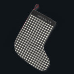 Vintage Black and White Gingham Plaid Personalised Small Christmas Stocking<br><div class="desc">Add timeless charm to your holiday decor with this vintage black and white gingham plaid personalised Christmas stocking. The classic plaid design brings a cosy, rustic feel to your mantel, while the personalised name adds a special touch. Perfect for those searching for personalised stockings, vintage-inspired holiday decor, or traditional black...</div>
