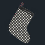 Vintage Black and White Gingham Plaid Personalised Small Christmas Stocking<br><div class="desc">Add timeless charm to your holiday decor with this vintage black and white gingham plaid personalised Christmas stocking. The classic plaid design brings a cosy, rustic feel to your mantel, while the personalised name adds a special touch. Perfect for those searching for personalised stockings, vintage-inspired holiday decor, or traditional black...</div>