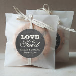 Vintage Black Chalkboard Love is Sweet Wedding Classic Round Sticker<br><div class="desc">Whimsical wedding favour stickers in a round shape feature "Love is Sweet" with a monogram of the bride and groom names and wedding date and with a soft white chalk appearance on a rustic black board background with textured look.</div>