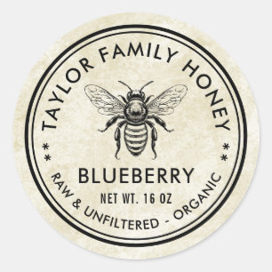 Vintage blueberry honey label with honey bee