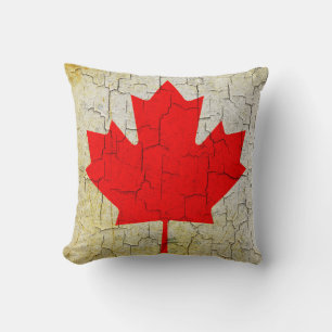 Vintage Canada flag on a cracked wall Cushion