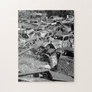 Vintage cars rusting away in a car yard jigsaw puzzle
