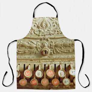 Vintage cash register,  covered in dust and cobweb apron