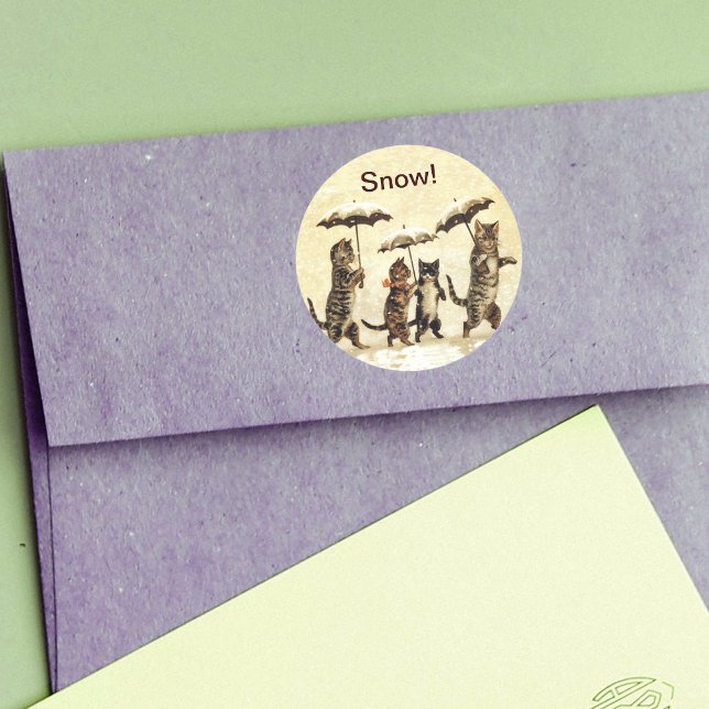 Vintage Cats Umbrellas Snow Classic Round Sticker (Four striped cats walking upright with umbrellas in snow on yellow round stickers.)