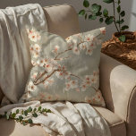 Vintage Cherry Blossom Sakura Branch Cushion<br><div class="desc">This elegant seamless watercolor pattern features flowing tree branches adorned with delicate cherry blossom blooms. Clusters of soft sakura flowers in blush pink and ivory tones gently unfold along thin natural branches, creating an airy, romantic composition that spreads gracefully across the design. Set against a muted sage, taupe, or warm...</div>