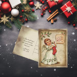 Vintage Cherub Red Stocking Christmas Holiday Postcard<br><div class="desc">Find your favourite vintage Christmas postcard from my collection of beautiful retro images from the past.
Laid on a delicately coloured background on the back and front,  with text on the back that can be removed
or personalised.
The Cherub holding a stuffed red stocking</div>