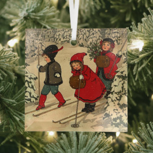 Vintage Children Skiing Through a Snowy Forest Glass Tree Decoration