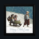 Vintage Children Sledding Christmas Winter Gift Box<br><div class="desc">Vintage Sledding This vintage Christmas card is based on an old-fashioned studio photograph, which captures two little children sitting on a sled, while an older child pulls the sled. It's Christmas time, and snow is all around! The vintage photograph is from 1912 -- 100 years old! These antique children capture...</div>