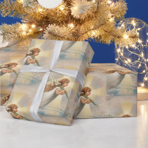 Vintage christmas angle with lily wrapping paper
