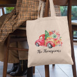 Vintage Christmas Red Truck | Family Name Tote Bag<br><div class="desc">Personalised christmas holiday tote bag featuring a vintage red truck carrying gifts,  a christmas tree,  a scattering of wintery snow,  and your family name.</div>