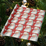 Vintage Christmas Santa Claus, Jolly and Winking Wrapping Paper<br><div class="desc">Vintage illustration Christmas holiday design featuring a happy,  jolly Santa Claus wearing a hat and winking as if he has a secret. Ho,  ho,  ho,  Merry Christmas!</div>