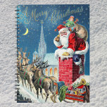 Vintage Christmas Victorian Santa Claus on Chimney Notebook<br><div class="desc">Vintage illustration Christmas holiday design featuring a Victorian Santa Claus on a rooftop about to go down the chimney. The reindeer and sleigh are on the roof waiting. A beautiful church is in the background with stars and the moon in the blue night sky.</div>