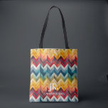 Vintage Colourful Chevron Monogram rainbow Tote Bag<br><div class="desc">Presenting our stylish monogram design, showcasing large typography initials in a timeless classic font, complemented by your name below and adorned with chic rainbow-coloured chevron stripes. With enough space to accommodate all your essentials, they are the perfect companions for any occasion. Whether you're searching for a thoughtful bridesmaid gift, a...</div>