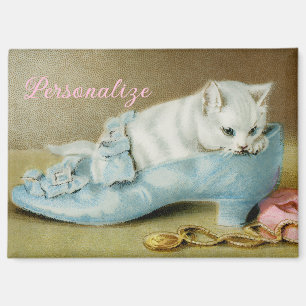 Vintage cute white kitten in a blue satin shoe magnet