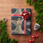 Vintage Elegant Christmas Angel Wrapping Paper<br><div class="desc">**A Touch of Heavenly Grace for Your Christmas Gifts** Wrap your Christmas gifts in the heavenly grace of our Vintage Angel wrapping paper. This exquisite design features a timeless image of a vintage angel, surrounded by a starry night sky, capturing the magic and wonder of the Christmas season. Perfect for...</div>