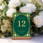 Vintage Emerald Green Faux Gold Elegant Wedding Table Number<br><div class="desc">This emerald green and gold elegant wedding table number, with a vintage design, has a vintage golden frame with baroque faux gold decorations on an emerald green background. The names are written in an elegant calligraphic script. All text can be personalised and has a golden colour similar to the gold...</div>