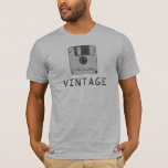 Vintage Floppy T-Shirt<br><div class="desc">This funny,  computer themed t-shirt features an old school floppy disc and the word Vintage underneath. A nostalgic image for geeks,  techs,  and anyone who uses computers.</div>