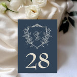 Vintage Floral Crest Navy & Cream Monogram Wedding Table Number<br><div class="desc">***this design is part of a collection*** Transport your wedding guests back in time with elegance and charm. This stunning collection encapsulates a sophisticated elegant vintage style with intricately woven botanical floral wreath framing your personalised monograms. - Formal vintage style with monogrammed floral wreaths - Comprehensive wedding collection including invitations,...</div>