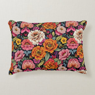 Vintage floral pattern with bold colours on black decorative cushion
