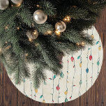 Vintage Fun Colourful Fa La Christmas String Light Brushed Polyester Tree Skirt<br><div class="desc">Add a playful retro touch to your holiday decor with this Vintage Fun Colourful Fa La Christmas String Light Pattern Christmas tree skirt. Featuring bright, whimsical string lights in a variety of festive colours, this design pops against a neutral background, creating a fun yet classic look for your Christmas tree....</div>