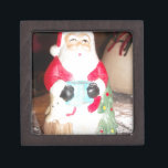 Vintage Fun Santa with Snow Art Print Keepsake Box<br><div class="desc">Vintage Fun Santa with Snow Art Print Introducing the "Vintage Fun Santa with Snow Art Print, " a charming and nostalgic piece that captures the essence of a classic Christmas. This artwork features a close-up, centred depiction of a vintage Santa Claus figurine, evoking warm memories of holiday celebrations. Design: Vintage...</div>