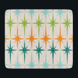 Vintage Geometric Starbursts Glass Cutting Board<br><div class="desc">Vintage. Geometrics. Starbursts. If you love any of those words, this retro Vintage Geometric Starbursts Decorative Glass Cutting Board is for you. This mid century modern design features a cream background with rows of turquoise, lime green, orange, and teal starbursts. This mod design pairs beautifully with Strange Little Onion’s Retro...</div>