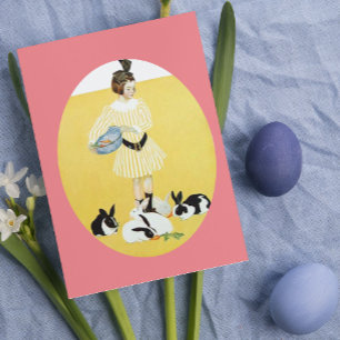 Vintage girl feeding rabbits holiday card