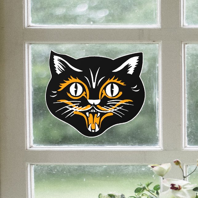 Vintage Halloween Cat Face Black Orange White  (Smiling black and orange Halloween cat face on window cling decoration for spooky season.)