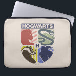 Vintage HOGWARTS™ Stamped Crest Laptop Sleeve<br><div class="desc">Show your house pride in bold, vintage-inspired style with this striking Hogwarts™ crest design. Featuring graphic silhouettes representing the four iconic houses — Gryffindor™, Slytherin™, Hufflepuff™, and Ravenclaw™ — this artwork blends classic symbolism with a modern, retro aesthetic. Each house emblem is set within a clean, color-blocked shield, creating a...</div>