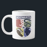 Vintage HOGWARTS™ Stamped Crest Large Coffee Mug<br><div class="desc">Show your house pride in bold, vintage-inspired style with this striking Hogwarts™ crest design. Featuring graphic silhouettes representing the four iconic houses — Gryffindor™, Slytherin™, Hufflepuff™, and Ravenclaw™ — this artwork blends classic symbolism with a modern, retro aesthetic. Each house emblem is set within a clean, color-blocked shield, creating a...</div>