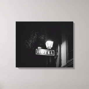 Vintage hotel sign, street light and many light canvas print