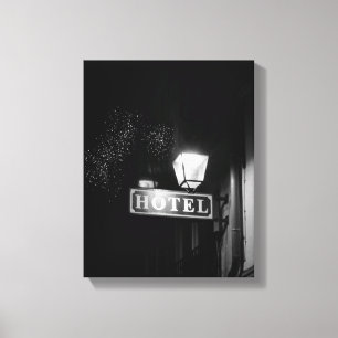 Vintage hotel sign, street light and many light canvas print