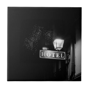 Vintage hotel sign, street light and many light tile