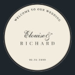 Vintage Ivory and Black Old Money Wedding Welcome Classic Round Sticker<br><div class="desc">Create a refined first impression with this ivory and black old money wedding welcome sticker, inspired by timeless vintage elegance and classic monochrome styling. The sophisticated ivory and black palette makes it perfect for luxury weddings, rehearsal dinners, engagement celebrations, welcome gift bags, and elegant wedding receptions. Ideal for sealing welcome...</div>