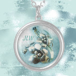Vintage Lily Brooch Pastel Blue Silver Plated Necklace<br><div class="desc">Customise this beautiful floral pendant necklace with her initials for a truly elegant gift she will treasure. The image in pastel blue is of a vintage metal brooch of a pair of lilies and is ultra feminine and unique.

This image is original jewellery photography of JLW_Photography.</div>