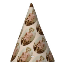 Vintage little blonde girl in pink dress party hat