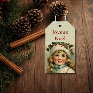 Vintage little girl with mistletoe gift tags