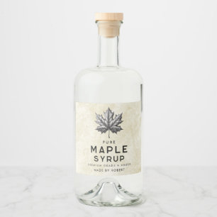 Vintage maple syrup label with leaf