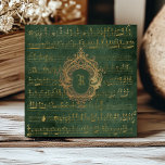 Vintage Monogram Crest Music Manuscript Green Gold Tile<br><div class="desc">This elegant vintage design features gold-coloured handwritten sheet music manuscript on a distressed dark emerald green and gold background. Personalise it with your monogram initial in Gothic font set off by an ornate antique gold crest frame.</div>