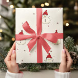 Vintage Neutral Christmas Snowmen with Red Hat Wrapping Paper<br><div class="desc">Wrap your holiday gifts in cosy nostalgia with this Vintage Christmas Snowmen Wrapping Paper, featuring charming snowmen in red hats on a neutral background. This classic design brings a touch of vintage warmth to any present, making it perfect for a timeless Christmas look. Ideal for family gatherings or holiday celebrations,...</div>