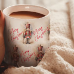 Vintage Nutcracker & Merry Christmas Coffee Mug<br><div class="desc">A beautifully illustrated vintage-style Nutcracker soldier, resplendent in his classic attire, stands tall, holding a Merry Christmas banner. The rich, warm colours and intricate details evoke a sense of yuletide nostalgia, making it a perfect choice for those who appreciate the classic holiday aesthetics. May your holiday season be filled with...</div>