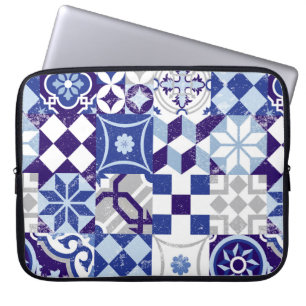 Vintage patchwork background with traditional blue laptop sleeve
