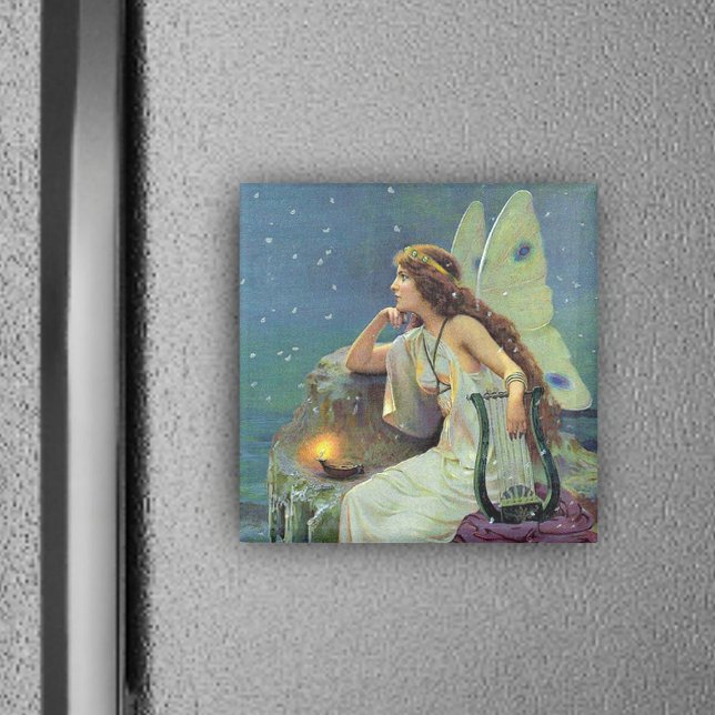Vintage Pretty Fairy Fae Harp Candle Ocean Magnet (Fairy in white dress on cliff with candle harp in night sky with stars on square magnet.)