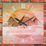 Vintage Pyramids in Cairo desert, Ancient Egypt<br><div class="desc">Wall Clocks: Vintage art clock featuring Ancient Pyramids in the desert on outskitrts of Cairo, Egypt. View on all of the pyramids in line is highlighting magnificence of the area. Top of Great Pyramid is still covered with flat decorative stone desks and let us imagine, what amazing view it must...</div>