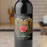 Vintage Red Rose and Gold Filigree 80th Birthday Wine Label<br><div class="desc">A golden tapestry of elegance, this 80th Birthday Wine Label features an ornate '80' that shimmers against a rich, dark background. At its heart, a single, velvety red rose blooms, its petals a vivid splash of colour symbolising love and enduring beauty. Customise the name and date to create a cherished...</div>