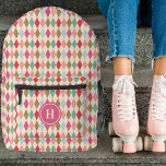Vintage Retro Diamond Pattern Pink Monogram<br><div class="desc">This stylish backpack features a vintage / retro diamond pattern in shades of berry red, magenta pink, light pink, gold, mint green, and light aqua blue. A monogram text template is included for simple personalisation - customise it or remove the template and circle if no monogram is desired. Great for...</div>