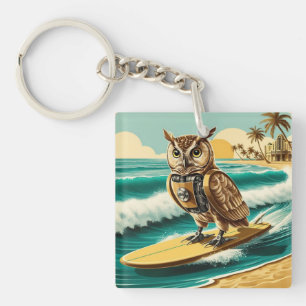 Vintage robot owl surfing on the beach key ring
